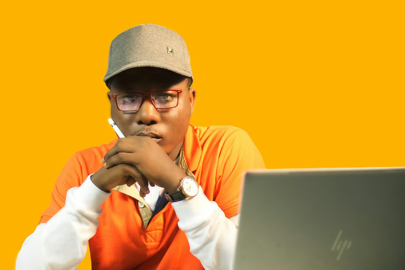 A tutor working on his laptop